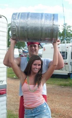 Matthew Stafford lifting a keg with an Auburn fan